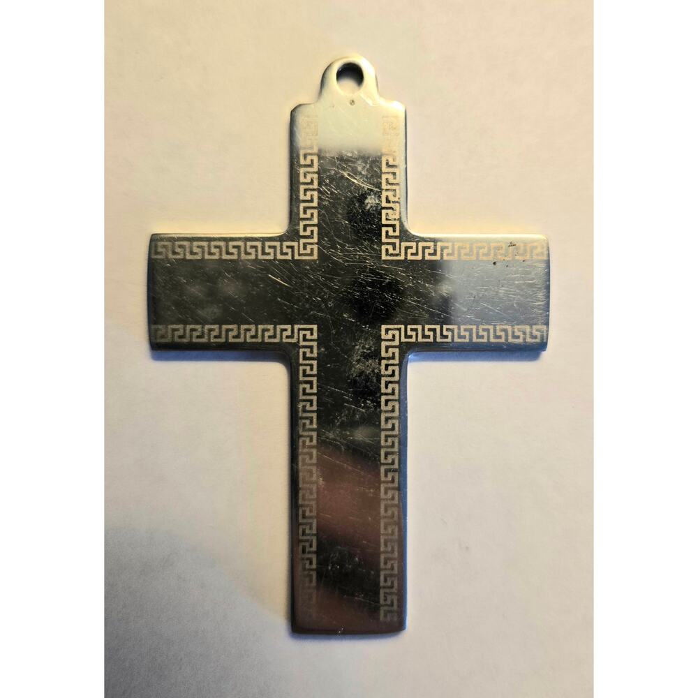 Silver Toned Cross Pendant with Gold Tone Embellishments Around the Edges
